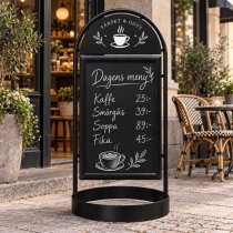 Gatupratare med griffelplast utanför café