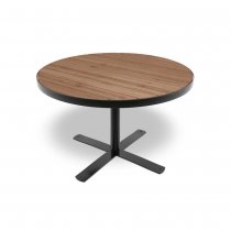 Runt bord med svart stomme utomhus